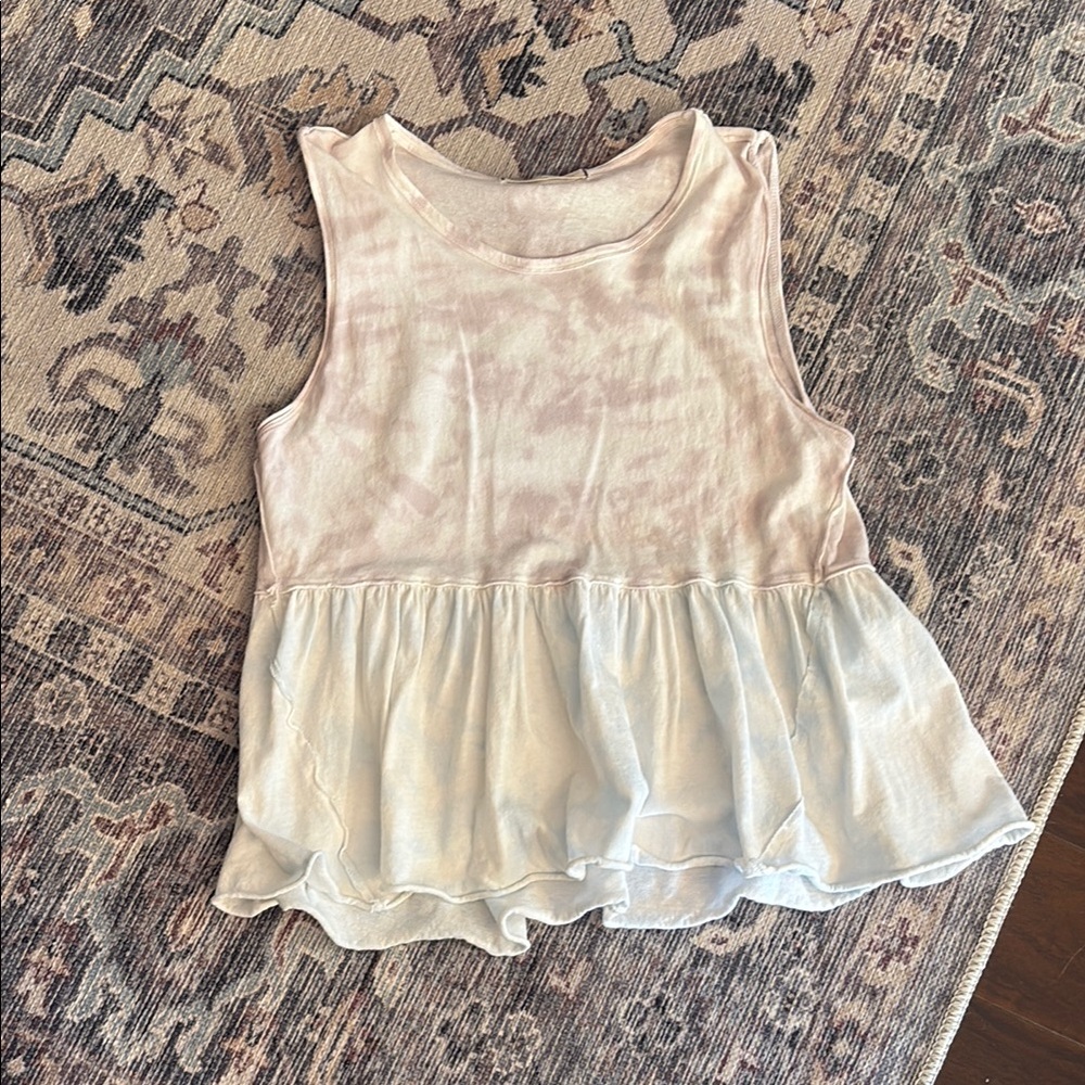 Free People tie dye relaxed peplum top. Excellent worn condition.